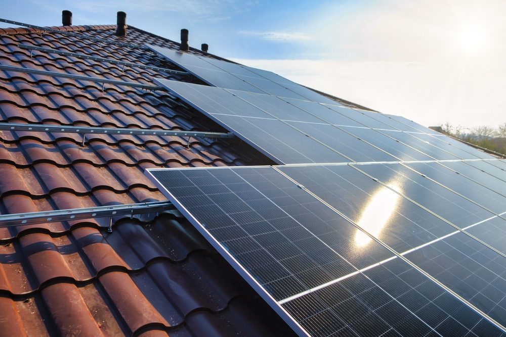 JA Solar panels being installed on a roof