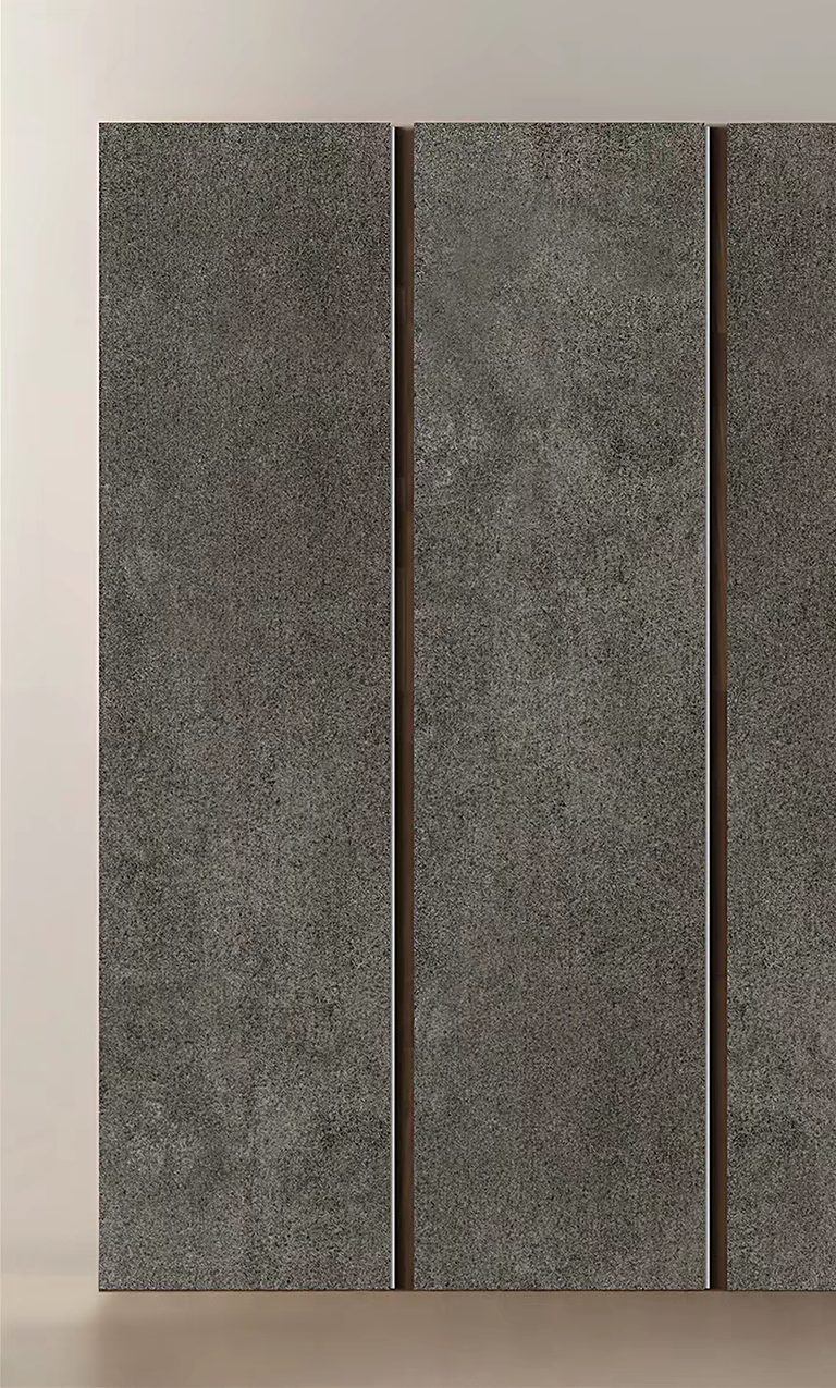 Dark grey stone-look panel with fine surface texture.