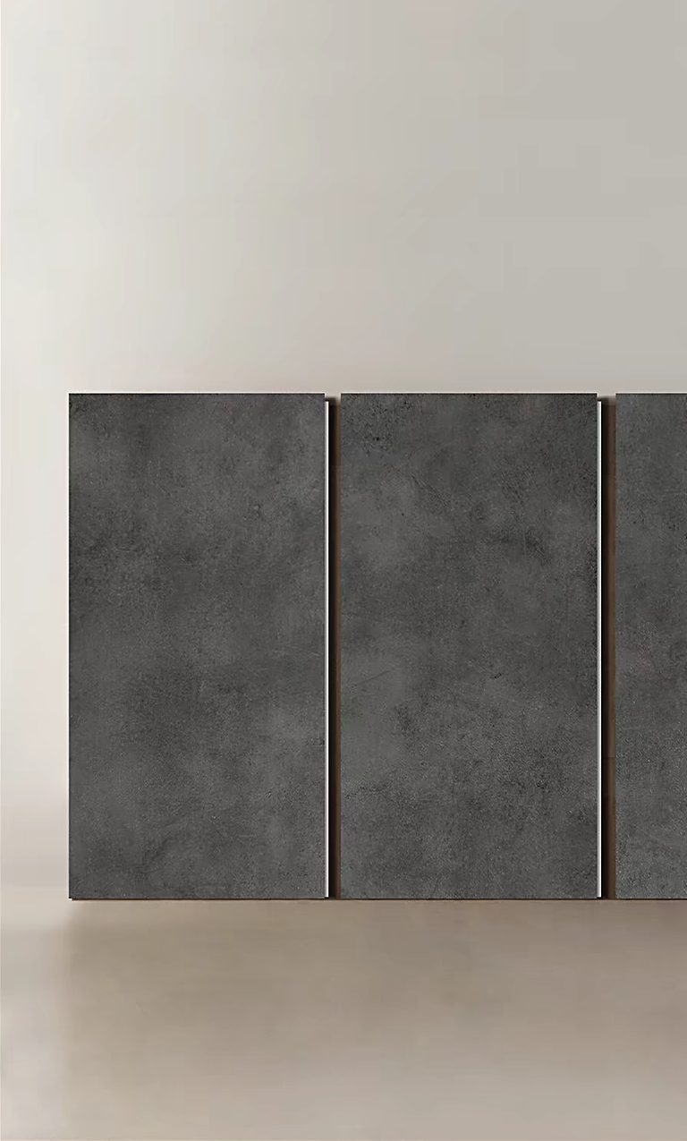 Dark grey stone-look panel with subtle tonal variation.
