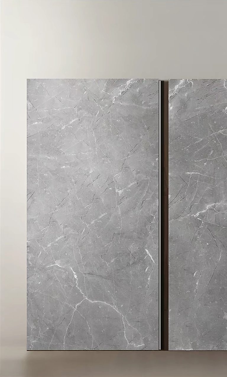 Light grey panel with soft marble-like veining.