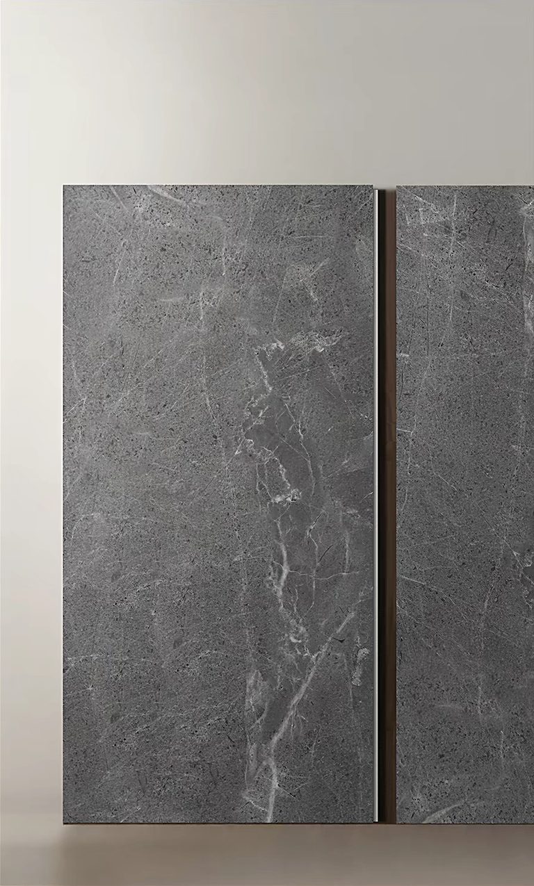 Dark grey panel with pronounced marble-like veining.