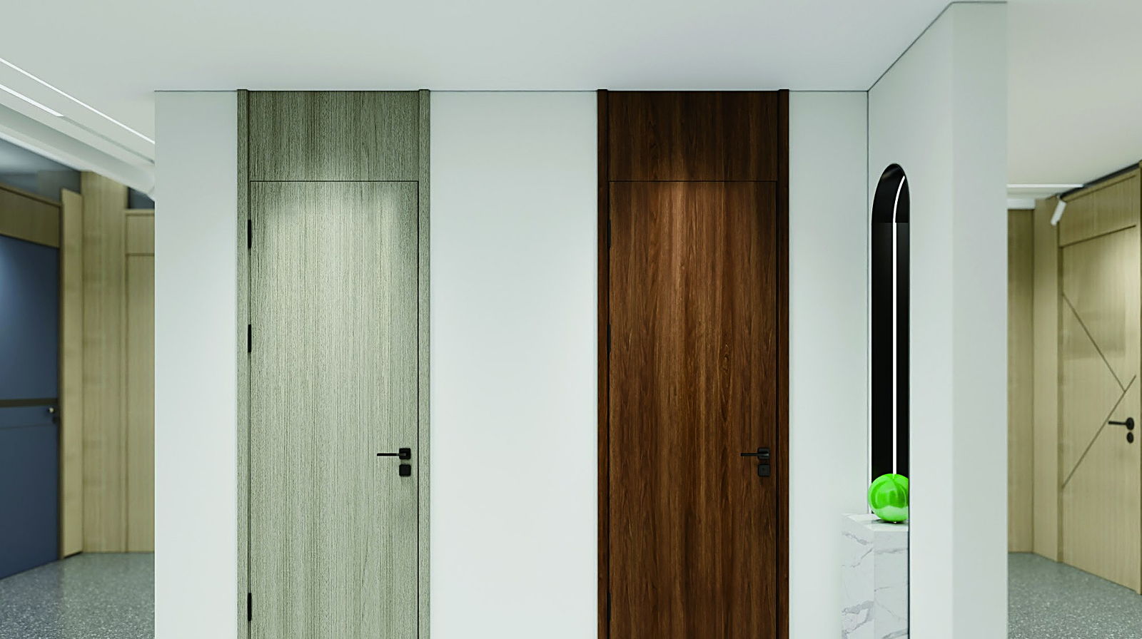 Pale oak and warm walnut flush interior doors along a corridor wall in a modern hallway