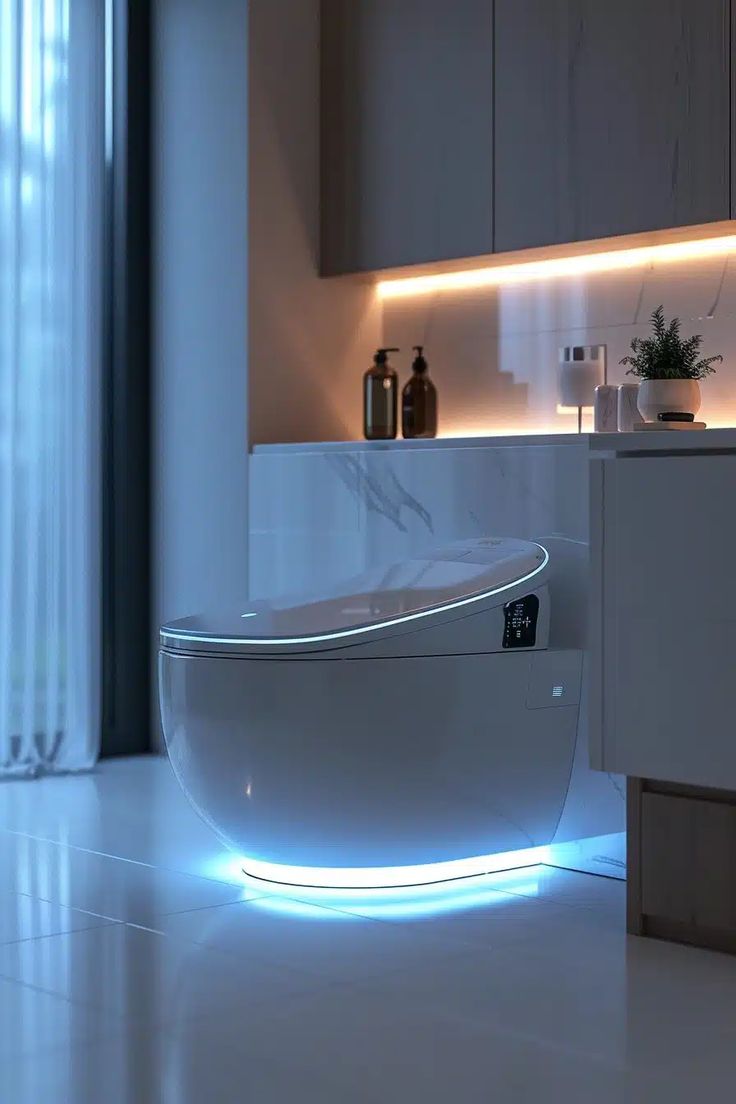 Contemporary bathroom with an illuminated bath and nearby digital control