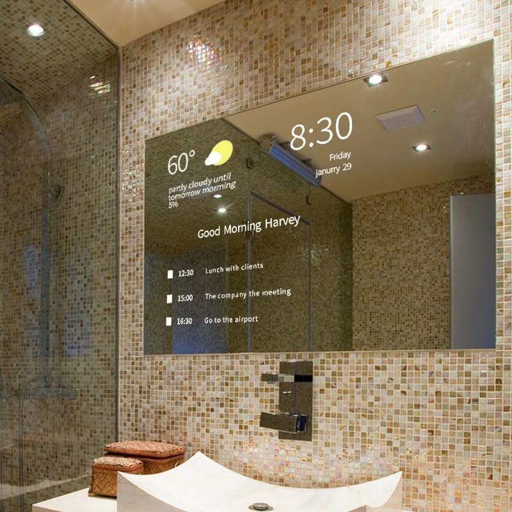 Bathroom mirror displaying time, weather and morning information