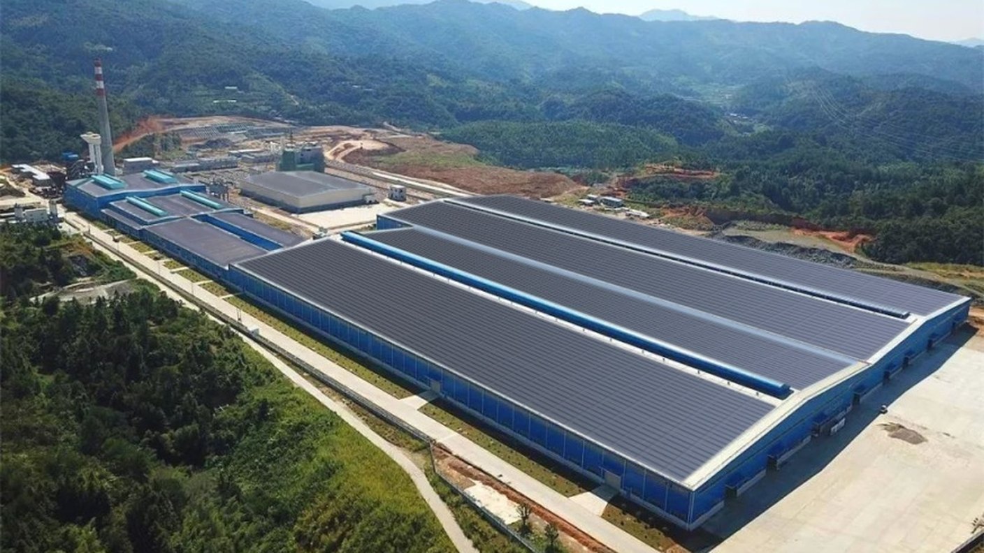 A large industrial roof covered in solar tiles